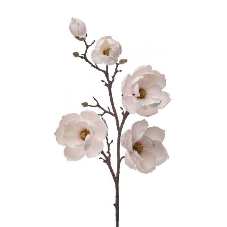 Artificial magnolia flower branch with light pink flowers on a white background