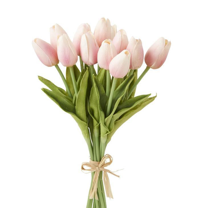 Bouquet of pink tulips with a beige ribbon on a white background