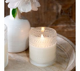"4 inch LED beaded glass candle with an elegant beaded glass exterior and warm flameless light, perfect for safe ambiance in home decor and centerpieces"