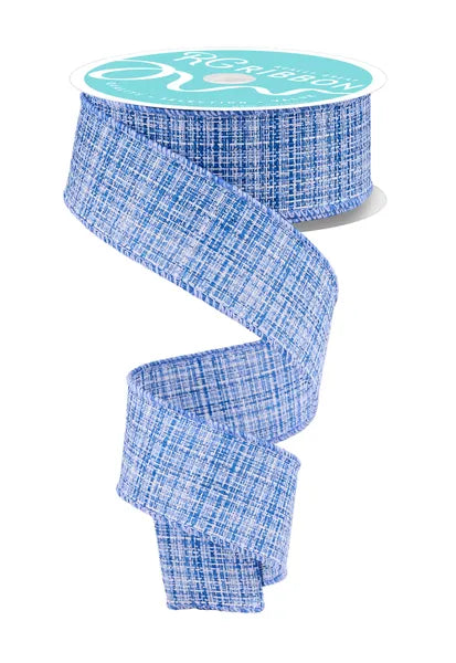 Blue plaid ribbon spool on a white background