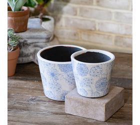 Light blue floral garden pots with a charming painted floral design, perfect for succulents, faux plants, and cottage-style home decor"