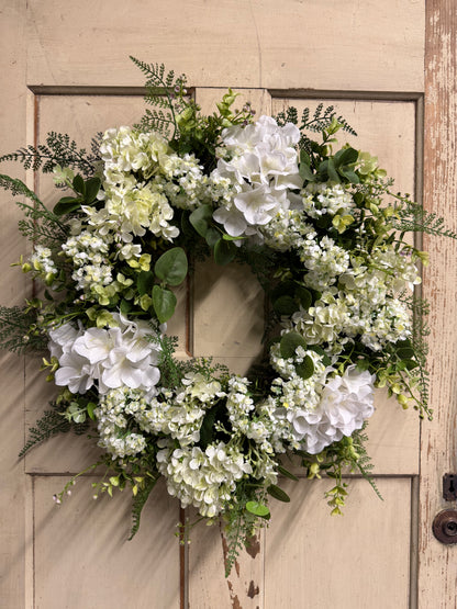 Lacey Grace hydrangea wreath with soft faux hydrangea blooms and lush greenery on a natural base, perfect for front doors and elegant year-round home decor"