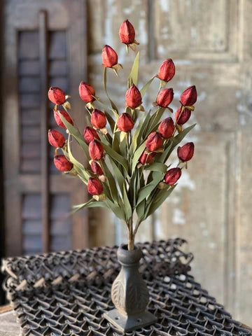 23 inch faux garnet beacon bush stem with deep red buds and green foliage arranged in a vintage 