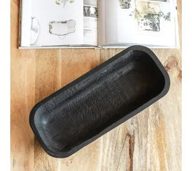 14.75 inch black wood dough bowl with a rustic hand-carved finish, perfect for displaying candles, faux florals, and farmhouse home decor