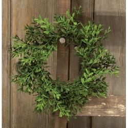 New England boxwood candle ring with 4 inch inner diameter and 7 inch outer diameter, featuring dense faux green boxwood leaves for candles and centerpieces"
