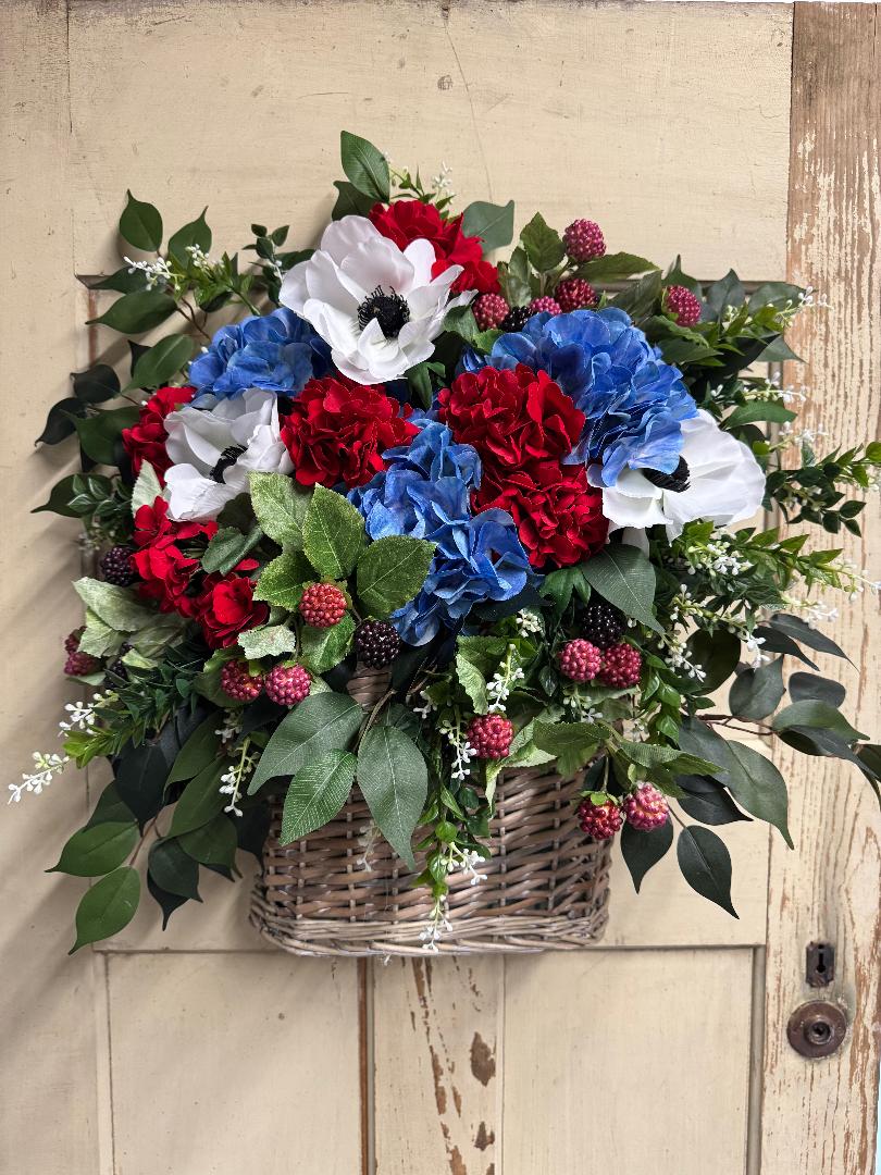  raspberry stems in a rustic woven basket