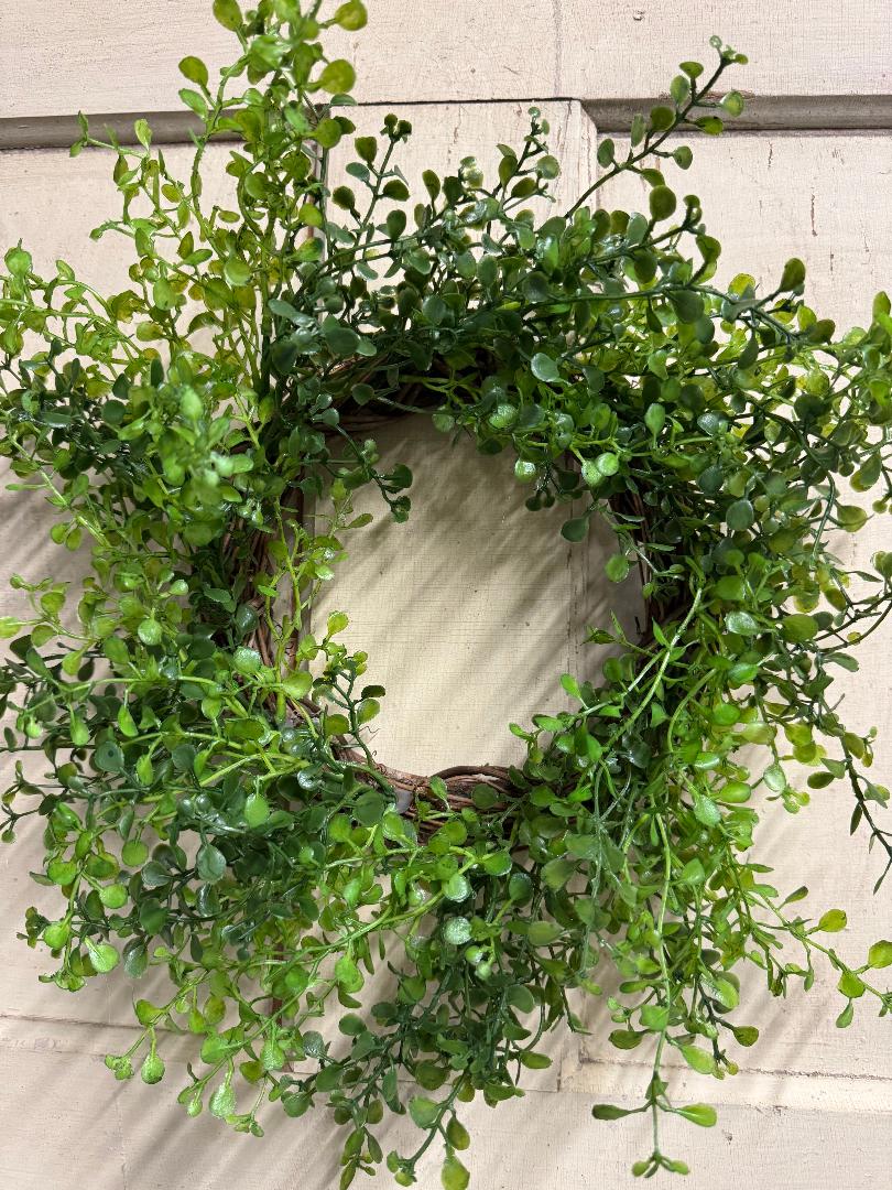 Baby boxwood leaves candle ring with dense faux small-leaf boxwood sprigs arranged in a ring, perfect for pillar candles and elegant table centerpieces"