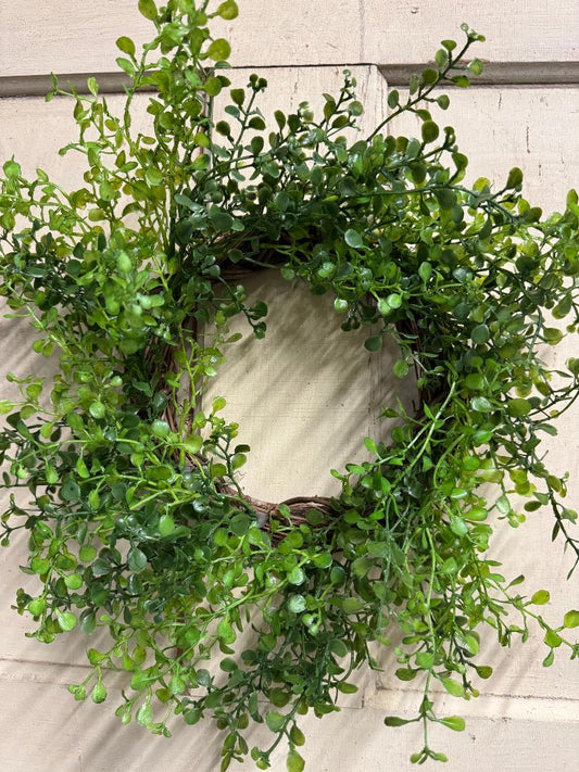 Baby boxwood leaves candle ring with dense faux small-leaf boxwood sprigs arranged in a ring, perfect for pillar candles and elegant table centerpieces"