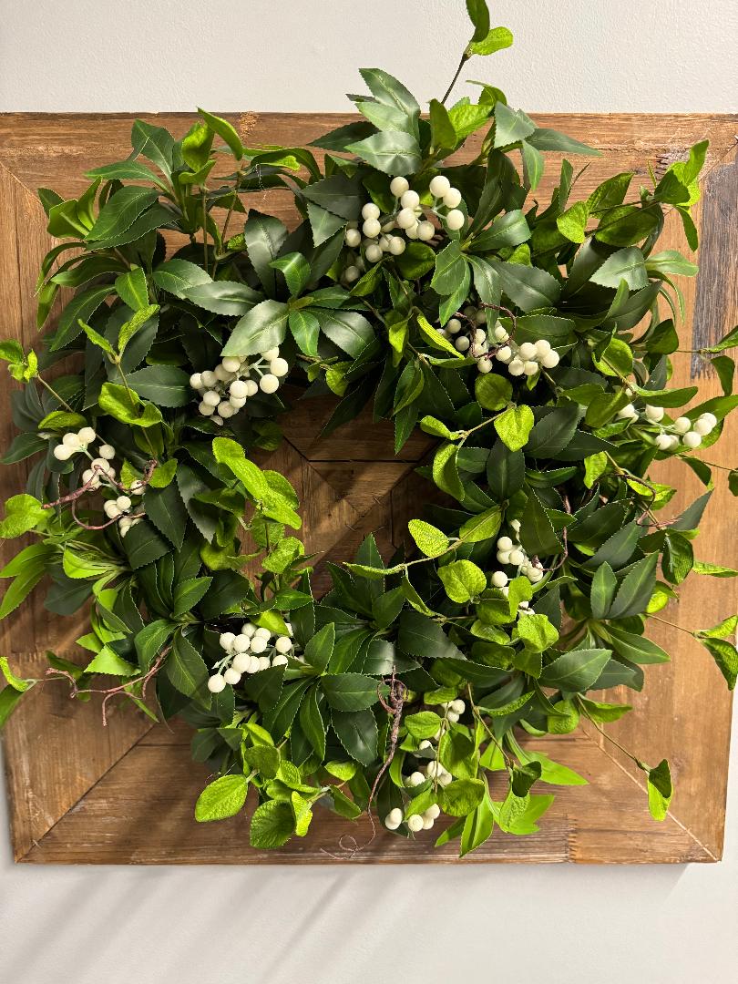 Green wreath with white berries 