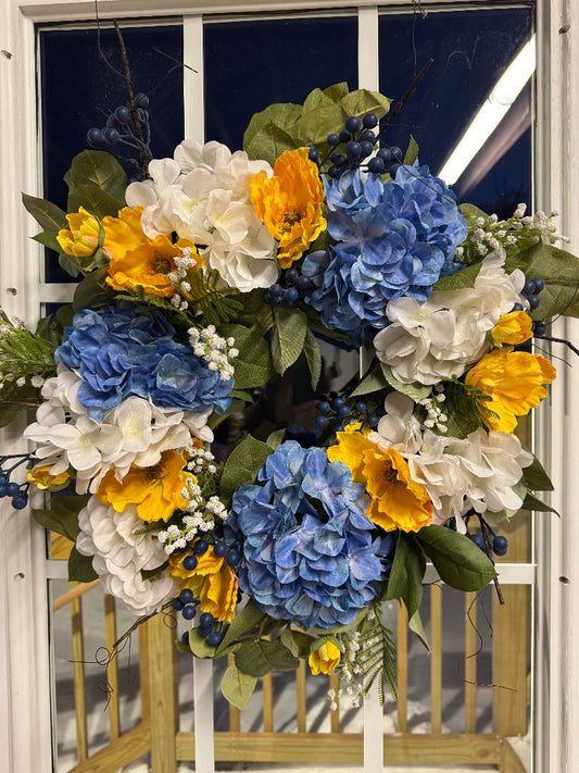 Join our hands-on Penelope wreath class and create a stunning blue & yellow garden wreath. Perfect creative night out with all materials included. Book your spot today!